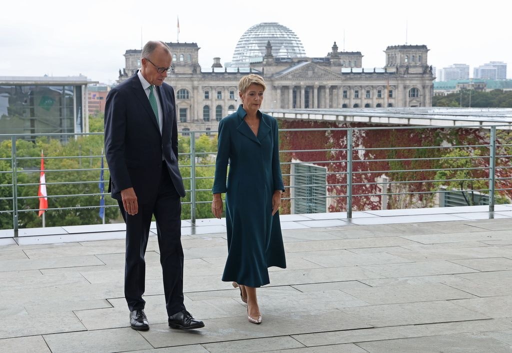 German Chancellor Friedrich Merz and Swiss President Karin Keller-Sutter on a terrace during a meeting at the Chancellery