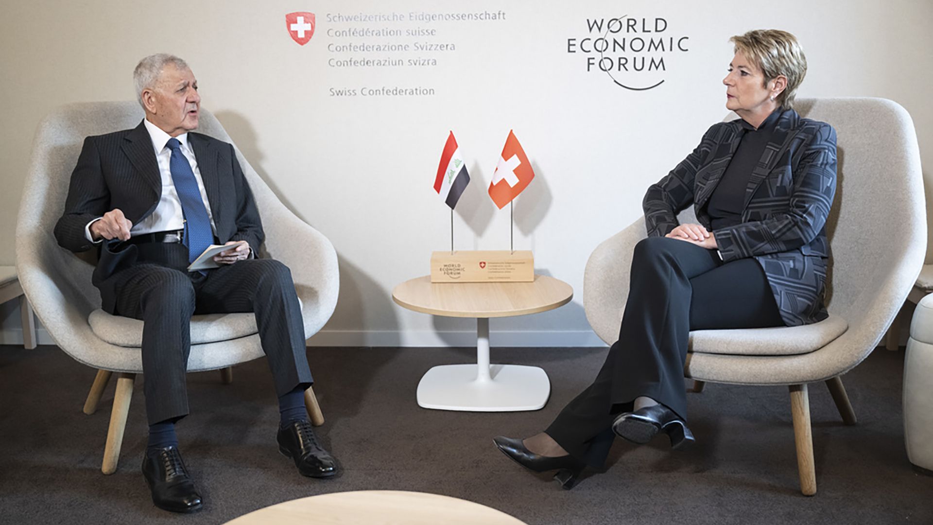 Abdul Latif Rashid, President of Iraq, left, speaks with Swiss Federal President Karin Keller-Sutter, at the World Economic Forum, WEF